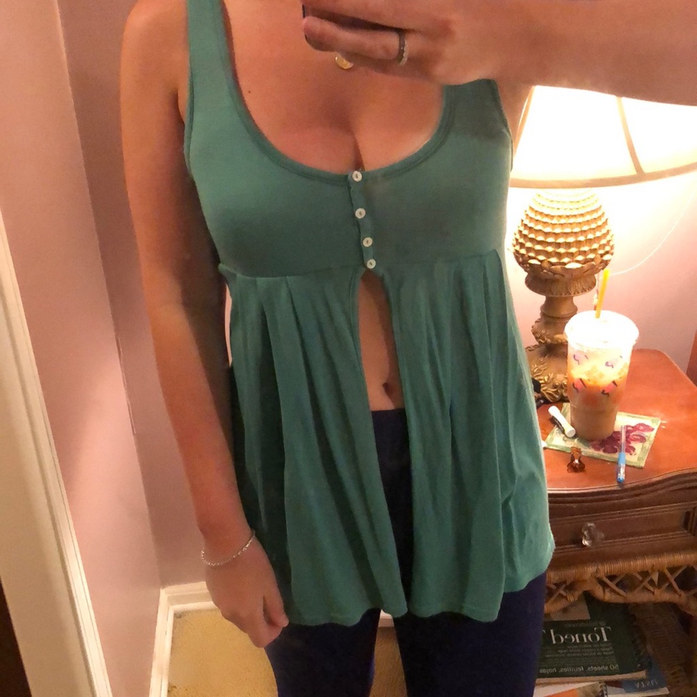 Cute turquoise top. Good for the beach